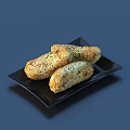 Golden Crunchy Sesame Bread Sticks on Black Square Plate Dark Blue Background
