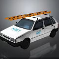 White Compact Car With Orange And White Roof Rack And NET Logo