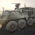 Sunlit Military Wheeled Tank With Green Camouflage And Top Mounted Machine Gun On Sandy Ground