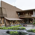 Detached Villa with Unique Gabled Roof Wooden Exterior Geometric Windows Balcony and Garden