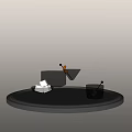 Wine Bottle and Glasses on Round Silver Tray with Ice Cubes and Amber Liquid