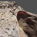 Natural Red Sandstone Rock Arch With Surrounding Desert Vegetation And Landscape