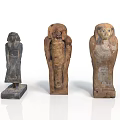 Three Ancient Egyptian Sculptures Featuring Human Shaped Carvings And Intricate Details