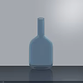 Light Blue Transparent Glass Vase Placed on Gray Desktop with Light Background Wall