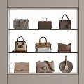 Stylish Designer Bags in Neutral Tones Displayed on Three Tiered Shelves