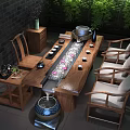 Wooden Chinese Style Tea Table And Chairs With Tea Set Green Plants And Water Feature