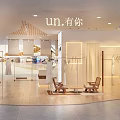 Elegant Modern Clothing Boutique Interior With Mannequins Clothing Displays And Plants