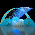 Blue Glowing Dolphin Shaped Structure With Wave Decorations And Particles