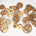Hardware Tools Display With Golden Metal Gears In Various Sizes And Shapes