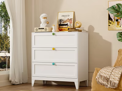 White Three Drawer Dresser With Colorful Knobs And Decorative Items In Living Room 3d model