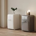 Retro Mini Fridges in White and Gray with Decorative Plant and Wooden Floor
