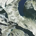 Snow Covered Mountain Landscape with Deep Valleys and Turquoise Lakes in Natural Scenic Environment