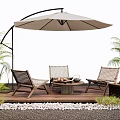 Woven Outdoor Chairs On Wooden Deck With Patio Umbrella Coffee Table And Palm Plants