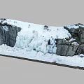 Garden Landscape With Thick Snow On Rocks And Cascading Ice Waterfall