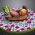 Fresh Vegetables in Wicker Basket on Pink Floral Tablecloth with Beets Sweet Potatoes Onions and Celery