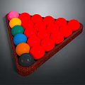 Various Colored Billiard Balls Neatly Arranged in Triangle Rack as Sports Equipment