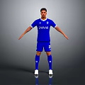 Man in blue sports uniform with EMAAR logo and number 2 standing with arms outstretched