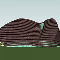 Innovative Museum Building With Wavy Dark Exterior And Green Glass Elements