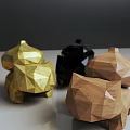 Geometric Cat Shaped Dolls with Golden Black and Wooden Textured Designs on Modern Table