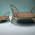 Two Modern Ottoman With Woven Metal Frame And Soft Brown Cushion Design