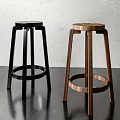 Modern Black And Wooden Bar Stools With Round Seats And Circular Footrests For Contemporary Kitchen