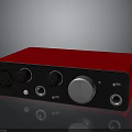 Red And Black Electronic Audio Device With Control Knobs And Input Ports