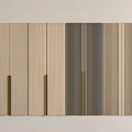 Wooden Panel Wall Design With Light Dark Striped Wood And Brass Handles