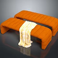 Orange Modern Sofa Bench with Quilted Design and Yellow Throw Blanket in Contemporary Setting