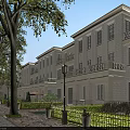 Elegant Classical Townhouse Exterior Featuring Balconies Trees Lamp Posts Stone Pathway and Greenery