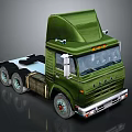Green Heavy Duty Truck With Cab Over Design And Multiple Wheels