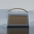 Portable Retro Style Radio with Silver Body Brown Handle and Antenna for Daily Use