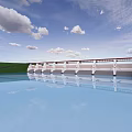Scenic Bridge Over Calm Water With Reflection Green Grass Blue Sky And White Clouds