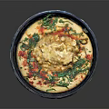 Appetizing Tasty Food in Black Plate with Yellow Main Red Garnish and Fresh Green Leaves
