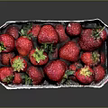 Ripe Fresh Juicy Red Strawberries with Green Leaves in Paper Carton