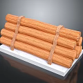 Stacked Wood Logs Tied With Rope Placed On White Stone Slab