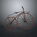 Vintage High Wheel Bicycle With Red Wheels And Black Classic Frame Design