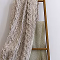Cozy Home Decor With Knitted Blanket Wooden Ladder And Leather Bean Bag