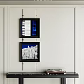 Two Black Framed City Line Artworks With Blue Background On Wall And Table Transparent Vinyl