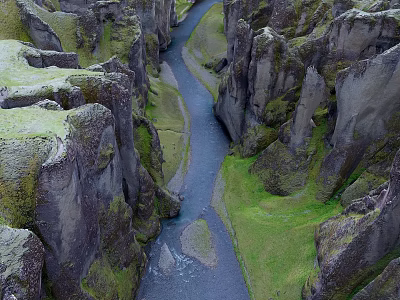 Scenic Canyon Landscape With River Flowing Through Moss Covered Rock Cliffs And Green Grass 3d model