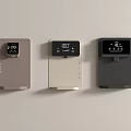 Three Modern Kitchen Appliances With Sleek Design And Digital Displays In Different Colors