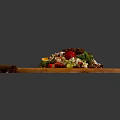 Fresh Mixed Salad With Tomato Mint Leaves And Lemon On Wooden Cutting Board