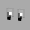 Modern Square Wall Lamps with Frosted Glass Shades and Black Brackets Illuminated on Beige Wall