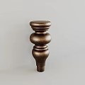 Brown Column with Multiple Circular Layers and Shiny Surface Against Light Colored Wall And Floor
