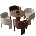 Four Modern Accent Chairs With Round Wooden Table And Small Potted Plant
