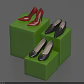 Stylish Shoes Displayed on Green Cubes Including Red High Heels and Black Pairs