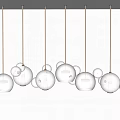 Modern Transparent Spherical Glass Chandeliers Hanging On White Wall With Soft Light