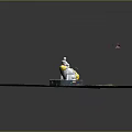 White Duck Standing On Small Platform In Green Grassy Area With Red Marker