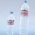 Evian Natural Mineral Water Two Different Sizes Bottles With Mountain Logo And Labels