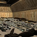 Wooden Planked Interior Walls With Sloped Roof Structure And Scattered Storage Items
