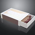 Open Matchbox With Red Wooden Matches And White Brown Labeled Exterior